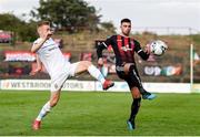 16 August 2019; Daniel Mandroiu of Bohemians in action against Paul Doyle of UCD during the SSE Airtricity League Premier Division match between Bohemians and UCD at Dalymount Park in Dublin. Photo by Sam Barnes/Sportsfile