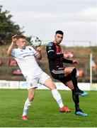 16 August 2019; Daniel Mandroiu of Bohemians in action against Paul Doyle of UCD during the SSE Airtricity League Premier Division match between Bohemians and UCD at Dalymount Park in Dublin. Photo by Sam Barnes/Sportsfile