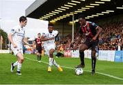 16 August 2019; Andre Wright of Bohemians in action against Evan Farrell, left, and Isaac Akinsete of UCD during the SSE Airtricity League Premier Division match between Bohemians and UCD at Dalymount Park in Dublin. Photo by Sam Barnes/Sportsfile