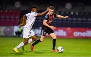 16 August 2019; Darragh Leahy of Bohemians in action against Isaac Akinsete of UCD during the SSE Airtricity League Premier Division match between Bohemians and UCD at Dalymount Park in Dublin. Photo by Sam Barnes/Sportsfile