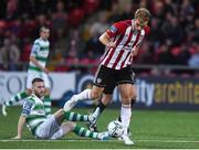 16 August 2019; Greg Sloggett of Derry City in action against Jack Byrne of Shamrock Roversduring the SSE Airtricity League Premier Division match between Derry City and Shamrock Rovers at the Ryan McBride Brandywell Stadium in Derry. Photo by Oliver McVeigh/Sportsfile