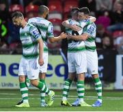 16 August 2019; Aaron McEneff of Shamrock Rovers, centre, celebrates with Greg Bolger and Aaron Greene after scoring his side's first goal during the SSE Airtricity League Premier Division match between Derry City and Shamrock Rovers at the Ryan McBride Brandywell Stadium in Derry. Photo by Oliver McVeigh/Sportsfile