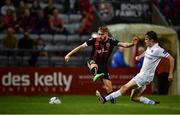 16 August 2019; Luke Wade-Slater of Bohemians gets his shot away despite the efforts of Evan Farrell of UCD during the SSE Airtricity League Premier Division match between Bohemians and UCD at Dalymount Park in Dublin. Photo by Sam Barnes/Sportsfile