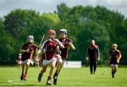 17 August 2019; Josh Dowling of Dicksboro, Co Kilkenny in action against Kevin Fitzpatrick of Newport, Co Tipperary in the Hurling U11 Boys A final during Day 1 of the Aldi Community Games August Festival, which saw over 3,000 children take part in a fun-filled weekend at UL Sports Arena in University of Limerick, Limerick. Photo by David Fitzgerald/Sportsfile