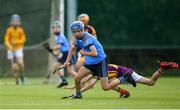 17 August 2019; Gus Lohan of Oranmore, Co Galway in action against Ollie Roche of Newport, Co Tipperary in the Hurling U11 Boys A semi-final during Day 1 of the Aldi Community Games August Festival, which saw over 3,000 children take part in a fun-filled weekend at UL Sports Arena in University of Limerick, Limerick. Photo by David Fitzgerald/Sportsfile