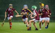 17 August 2019; Harry Noone of Newport, Co Tipperary in action against Dan Carroll of Dicksboro, Co Kilkenny in the Hurling U11 Boys A final during Day 1 of the Aldi Community Games August Festival, which saw over 3,000 children take part in a fun-filled weekend at UL Sports Arena in University of Limerick, Limerick. Photo by David Fitzgerald/Sportsfile