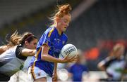 17 August 2019; Aishling Moloney of Tipperary in action against Gráinne O'Loughlin of Sligo during the TG4 All-Ireland Ladies Football Intermediate Championship Semi-Final match between Sligo and Tipperary at Nowlan Park in Kilkenny. Photo by Piaras Ó Mídheach/Sportsfile