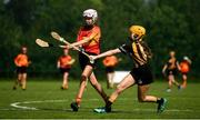 17 August 2019; Shauna Flanagan of Moycarkey-Borris, Co Tipperary in action against Aine Purcell of Glenmore-Tulloger-Rosbercon in the Camogie U14 final during Day 1 of the Aldi Community Games August Festival, which saw over 3,000 children take part in a fun-filled weekend at UL Sports Arena in University of Limerick, Limerick. Photo by David Fitzgerald/Sportsfile