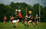 17 August 2019; Shauna Flanagan of Moycarkey-Borris, Co Tipperary in action against Aine Purcell of Glenmore-Tulloger-Rosbercon in the Camogie U14 final during Day 1 of the Aldi Community Games August Festival, which saw over 3,000 children take part in a fun-filled weekend at UL Sports Arena in University of Limerick, Limerick. Photo by David Fitzgerald/Sportsfile