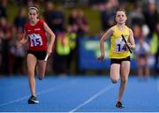 17 August 2019; Orlagh Foul of Glenswill, Co Donegal, right, and Anna Murphy of Blackrock, Co. Louth, competing in the Girls' U12 Relays during Day 1 of the Aldi Community Games August Festival, which saw over 3,000 children take part in a fun-filled weekend at UL Sports Arena in University of Limerick, Limerick. Photo by Ben McShane/Sportsfile