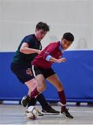 18 August 2019; Edwin Saju of Caherdavin, Co Limerick in action against Shane Flannery of Kilmaine, Co Mayo in the Futsal U15 boys semi-final during Day 2 of the Aldi Community Games August Festival, which saw over 3,000 children take part in a fun-filled weekend at UL Sports Arena in University of Limerick, Limerick. Photo by David Fitzgerald/Sportsfile