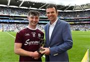 18 August 2019; Pat Fenlon, Group Finance Director, ESB, presents Sean McDonagh of Galway with the Player of the Match award for his major performance in the Electric Ireland GAA All-Ireland Minor Hurling Championship Final. Throughout the Championships, fans can follow the conversation, vote for their player of the week, support the Minors and be a part of something major through the hashtag #GAAThisIsMajor. Photo by Brendan Moran/Sportsfile