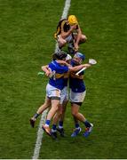 18 August 2019; John McGrath, right, Ger Browne, Willie Connors, left of Tipperary celebrate, as a dejected Richie Leahy of Kilkenny sits on the field after the GAA Hurling All-Ireland Senior Championship Final match between Kilkenny and Tipperary at Croke Park in Dublin. Photo by Daire Brennan/Sportsfile