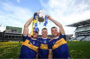 18 August 2019; Tipperary team mates, from left, Noel McGrath, Brian McGrath and John McGrath with the Liam MacCarthy cup following the GAA Hurling All-Ireland Senior Championship Final match between Kilkenny and Tipperary at Croke Park in Dublin. Photo by Stephen McCarthy/Sportsfile