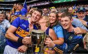 18 August 2019; Tipperary captain Séamus Callanan is congratulated by his mother Mary, dad John, sister Fiona, and his brother John as he holds the Liam MacCarthy Cup after the GAA Hurling All-Ireland Senior Championship Final match between Kilkenny and Tipperary at Croke Park in Dublin. Photo by Ray McManus/Sportsfile