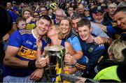 18 August 2019; Séamus Callanan of Tipperary celebrates with his family and the Liam MacCarthy cup following the GAA Hurling All-Ireland Senior Championship Final match between Kilkenny and Tipperary at Croke Park in Dublin. Photo by Stephen McCarthy/Sportsfile