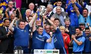 18 August 2019; Tipperary manager Liam Sheedy, 2nd from left, and coaches, from left, Darragh Egan, Eamon O'Shea and Tommy Dunne, celebrate with the Liam MacCarthy cup after the GAA Hurling All-Ireland Senior Championship Final match between Kilkenny and Tipperary at Croke Park in Dublin. Photo by Brendan Moran/Sportsfile