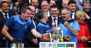 18 August 2019; Tipperary manager Liam Sheedy, 2nd from left, and coaches, from left, Darragh Egan, Eamon O'Shea and Tommy Dunne, celebrate with the Liam MacCarthy cup after the GAA Hurling All-Ireland Senior Championship Final match between Kilkenny and Tipperary at Croke Park in Dublin. Photo by Brendan Moran/Sportsfile