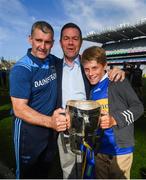 18 August 2019; Tipperary sponsor Declan Kelly, CEO, Teneo, and his son Adrian with manager Liam Sheedy following the GAA Hurling All-Ireland Senior Championship Final match between Kilkenny and Tipperary at Croke Park in Dublin. Photo by Stephen McCarthy/Sportsfile