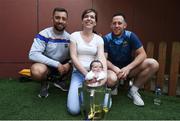 19 August 2019; James Barry, left, and Seán O’Brien of Tipperary with Stacey Hughes and her daughter Leila Hughes-McDermott, aged 6 weeks, from Enniscrone, Co. Sligo, with the Liam MacCarthy Cup on a visit by the Tipperary All-Ireland hurling champions to Children's Health Ireland at Crumlin in Dublin.  Photo by Sam Barnes/Sportsfile