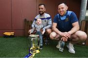 19 August 2019; James Barry, left, and Seán O’Brien of Tipperary with Liam Tomney, aged 1, the Liam MacCarthy Cup on a visit by the Tipperary All-Ireland hurling champions to Children's Health Ireland at Crumlin in Dublin.  Photo by Sam Barnes/Sportsfile