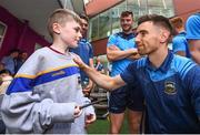 19 August 2019; John O’Dwyer of Tipperary with Harry Tutty, aged 9, from Gorey, Co. Wexford, on a visit by the Tipperary All-Ireland hurling champions to Children's Health Ireland at Crumlin in Dublin.  Photo by Sam Barnes/Sportsfile