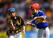18 August 2019; Brogan McCrory, St Francis PS, Lurgan, Armagh, representing Tipperary, in action against Kohn Paul Houlihan, Scoil Mocheallog, Kilmallock, Limerick, representing Kilkenny, during the INTO Cumann na mBunscol GAA Respect Exhibition Go Games prior to the GAA Hurling All-Ireland Senior Championship Final match between Kilkenny and Tipperary at Croke Park in Dublin. Photo by Seb Daly/Sportsfile