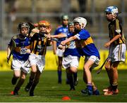 18 August 2019; Ross Deegan, Scoil Tighearnach Naofa, Cullohill, Laois, representing Kilkenny, in action against Eoin O'Flaherty, Scoil Náisiúnta Ard Fhearta, Kerry, representing Tipperary, during the INTO Cumann na mBunscol GAA Respect Exhibition Go Games prior to the GAA Hurling All-Ireland Senior Championship Final match between Kilkenny and Tipperary at Croke Park in Dublin. Photo by Seb Daly/Sportsfile