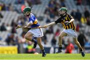 18 August 2019; Seán Farrell, Donaskeigh NS, Dundrum, Tipperary, representing Tipperary, in action against Colin McAweeney, Scoil Assaim, Raheny, Dublin, representing Kilkenny, during the INTO Cumann na mBunscol GAA Respect Exhibition Go Games prior to the GAA Hurling All-Ireland Senior Championship Final match between Kilkenny and Tipperary at Croke Park in Dublin. Photo by Eóin Noonan/Sportsfile