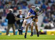 18 August 2019; Seán Farrell, Donaskeigh NS, Dundrum, Tipperary, representing Tipperary, in action against Colin McAweeney, Scoil Assaim, Raheny, Dublin, representing Kilkenny, during the INTO Cumann na mBunscol GAA Respect Exhibition Go Games prior to the GAA Hurling All-Ireland Senior Championship Final match between Kilkenny and Tipperary at Croke Park in Dublin. Photo by Eóin Noonan/Sportsfile