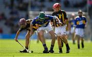 18 August 2019; Seán Farrell, Donaskeigh NS, Dundrum, Tipperary, representing Tipperary, in action against Colin McAweeney, Scoil Assaim, Raheny, Dublin, representing Kilkenny, during the INTO Cumann na mBunscol GAA Respect Exhibition Go Games prior to the GAA Hurling All-Ireland Senior Championship Final match between Kilkenny and Tipperary at Croke Park in Dublin. Photo by Eóin Noonan/Sportsfile