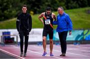 21 August 2019; Brian Gregan of Ireland with meet director Noel Guiden, right, and Athletics Ireland physiotherapsit Gary Scott, left, after pulling up during the men's 400m event during the 2019 Morton Games at Morton Stadium in Santry, Dublin. Photo by Stephen McCarthy/Sportsfile