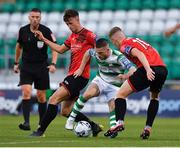 23 August 2019; Jack Byrne of Shamrock Rovers in action against Stephen Meeney, left, and Jamie Hollywood of Drogheda United during the Extra.ie FAI Cup Second Round match between Shamrock Rovers and Drogheda United at Tallaght Stadium in Dublin. Photo by Seb Daly/Sportsfile