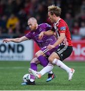 23 August 2019; Chris Shields of Dundalk in action against Greg Sloggett of Derry City during the Extra.ie FAI Cup Second Round match between Derry City and Dundalk at Ryan McBride Brandywell Stadium in Derry. Photo by Oliver McVeigh/Sportsfile