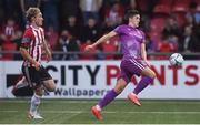 23 August 2019; Jamie McGrath of Dundalk in action against Greg Sloggett of Derry City  during the Extra.ie FAI Cup Second Round match between Derry City and Dundalk at Ryan McBride Brandywell Stadium in Derry. Photo by Oliver McVeigh/Sportsfile