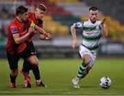 23 August 2019; Jack Byrne of Shamrock Rovers in action against Jake Hyland, left, and Jamie Hollywood of Drogheda United during the Extra.ie FAI Cup Second Round match between Shamrock Rovers and Drogheda United at Tallaght Stadium in Dublin. Photo by Seb Daly/Sportsfile