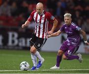 23 August 2019; Grant Gillespie of Derry City in action against Sean Murray of Dundalk during the Extra.ie FAI Cup Second Round match between Derry City and Dundalk at Ryan McBride Brandywell Stadium in Derry. Photo by Oliver McVeigh/Sportsfile