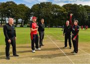 24 August 2019; Captains Greg Thompson of Waringstown CC, left, and Fiachra Tucker of Pembroke CC, with umpires Alan Neill and Michael Foster, and third upire Jareth McCready, right, during the coin toss prior to the Clear Currency Irish Senior Cup Final match between Waringstown CC and Pembroke CC at The Hills Cricket Club in Skerries, Dublin. Photo by Seb Daly/Sportsfile