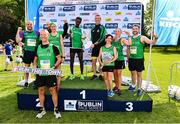 24 August 2019; Yared Derese of Carrick Aces A.C., centre left, celebrates with Carrick Aces team-mates and the Frank Duffy Memorial Trophy after winning the Men's race during the KBC & Dublin Marathon Race Series, where, over 5,200 runners took part in the Frank Duffy 10 Mile, part of the KBC Dublin Race Series 2019 at Phoenix Park in Dublin. Photo by Sam Barnes/Sportsfile
