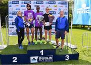 24 August 2019; Men's race medallists, from left, Mick Clohisey of Raheny Shamrocks AC, silver, Yared Derese of Carrick Aces AC, gold, and Josh Griffiths of Swansea Harriers, bronze, alongside, Roisin Meehan, KBC Ireland Marketing manager, far left and Barry D'Arcy, Chief Risk Officer, KBC Ireland, second right, following the Frank Duffy 10 mile Men's Race. Over 5,200 runners took part in the Frank Duffy 10 Mile, part of the KBC Dublin Race Series 2019 at Phoenix Park in Dublin. Photo by Sam Barnes/Sportsfile