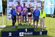 24 August 2019; Men's race medallists, from left, Mick Clohisey of Raheny Shamrocks AC, silver, Yared Derese of Carrick Aces AC, gold, and Josh Griffiths of Swansea Harriers, bronze, alongside, Roisin Meehan, KBC Ireland Marketing manager, far left, Barry D'Arcy, Chief Risk Officer, KBC Ireland, second right, and Paul Moran, Dublin Marathon Chairperson, far right, following the Frank Duffy 10 mile Men's Race. Over 5,200 runners took part in the Frank Duffy 10 Mile, part of the KBC Dublin Race Series 2019 at Phoenix Park in Dublin. Photo by Sam Barnes/Sportsfile
