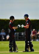 24 August 2019; Theo Lawson, left, and Shaheen Khan of Pembroke CC during the Clear Currency Irish Senior Cup Final match between Waringstown CC and Pembroke CC at The Hills Cricket Club in Skerries, Dublin. Photo by Seb Daly/Sportsfile