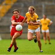24 August 2019; Niamh Enright of Antrim in action against Ceire Nolan of Louth during the TG4 All-Ireland Ladies Football Junior Championship Semi-Final match between Louth and Antrim at St Tiernach's Park in Clones, Monaghan. Photo by Ray McManus/Sportsfile