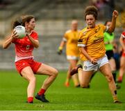 24 August 2019; Susan Byrne of Louth in action against Saoirse Tennyson of Antrim  during the TG4 All-Ireland Ladies Football Junior Championship Semi-Final match between Louth and Antrim at St Tiernach's Park in Clones, Monaghan. Photo by Ray McManus/Sportsfile