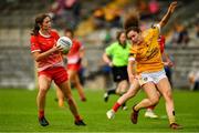 24 August 2019; Susan Byrne of Louth in action against Saoirse Tennyson of Antrim during the TG4 All-Ireland Ladies Football Junior Championship Semi-Final match between Louth and Antrim at St Tiernach's Park in Clones, Monaghan. Photo by Ray McManus/Sportsfile