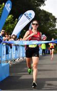 24 August 2019; Breege Connolly of City of Derry Spartans AC crosses the line to win the Women's Frank Duffy 10 Mile race. Over 5,200 runners took part in the Frank Duffy 10 Mile, part of the KBC Dublin Race Series 2019 at Phoenix Park in Dublin. Photo by Sam Barnes/Sportsfile