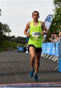 24 August 2019; Josh Griffiths crosses the line to finish third in the men's Frank Duffy 10 Mile race. Over 5,200 runners took part in the Frank Duffy 10 Mile, part of the KBC Dublin Race Series 2019 at Phoenix Park in Dublin. Photo by Sam Barnes/Sportsfile
