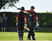24 August 2019; Shaheen Khan of Pembroke CC, right, is congratulated by team-mate Barry McCarthy after scoring a century during the Clear Currency Irish Senior Cup Final match between Waringstown CC and Pembroke CC at The Hills Cricket Club in Skerries, Dublin. Photo by Seb Daly/Sportsfile