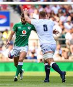 24 August 2019; Ross Byrne of Ireland kicks the ball as George Kruis of England defends during the Quilter International match between England and Ireland at Twickenham Stadium in London, England. Photo by Brendan Moran/Sportsfile