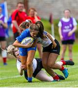 24 August 2019; Rachel Conroy of Leinster is tackled by Sarah Shrestha and Toni Macartney of Ulster during the Under 18 Girls Interprovincial Rugby Championship match between Ulster and Leinster at Armagh RFC in Armagh. Photo by John Dickson/Sportsfile